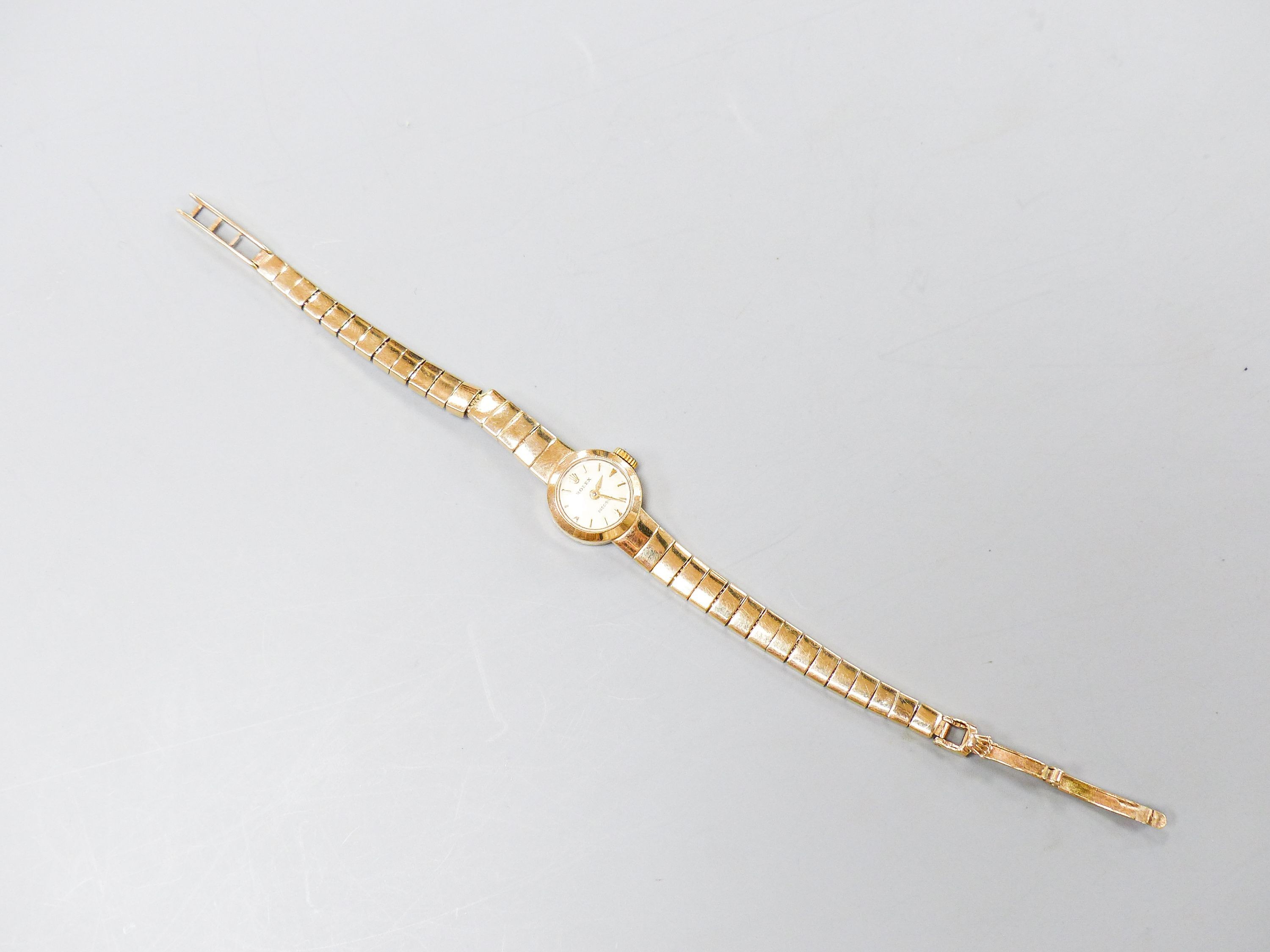 A lady's 9ct gold Rolex manual wind wrist watch on 9ct gold strap, case diameter 15mm